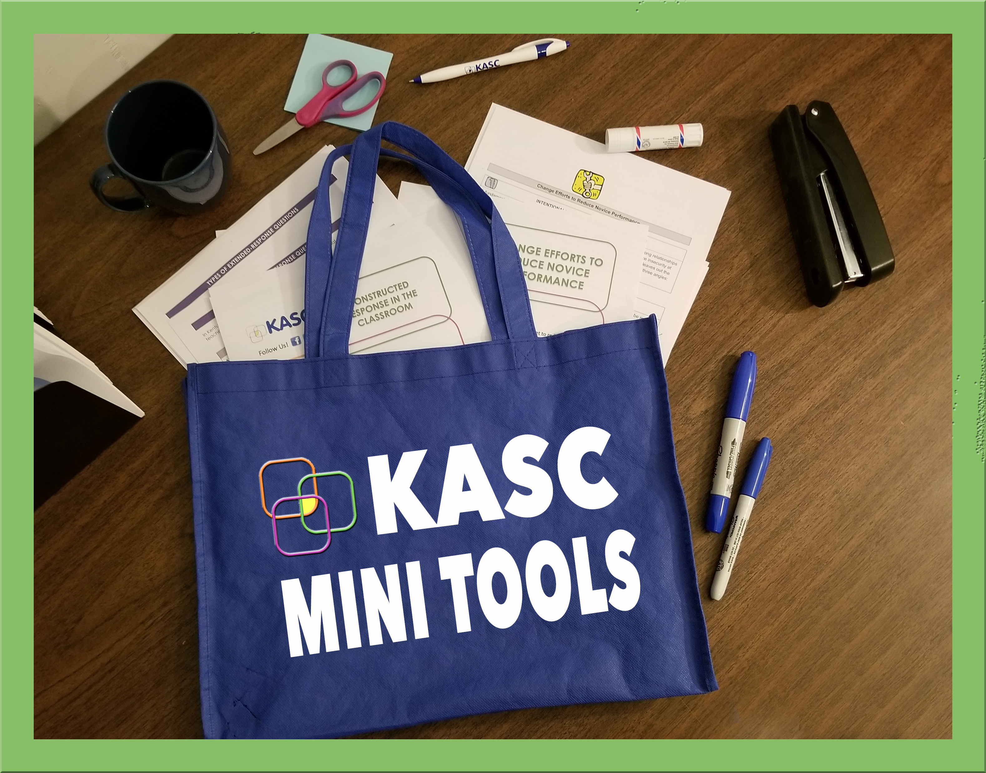 Blue teacher bag with mini tools and desk items